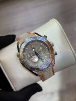 ساعت مردانه امگا سيمستر سه موتوره طوسي نارنجي - Image 4