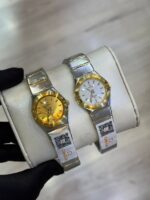 ساعت امگا زنانه دورنگ طلايي صفحه طلايي خطي - Image 3