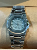 ساعت استيل زنانه طرح پتک فيليپ نقره ای صفحه خاکی - Image 3