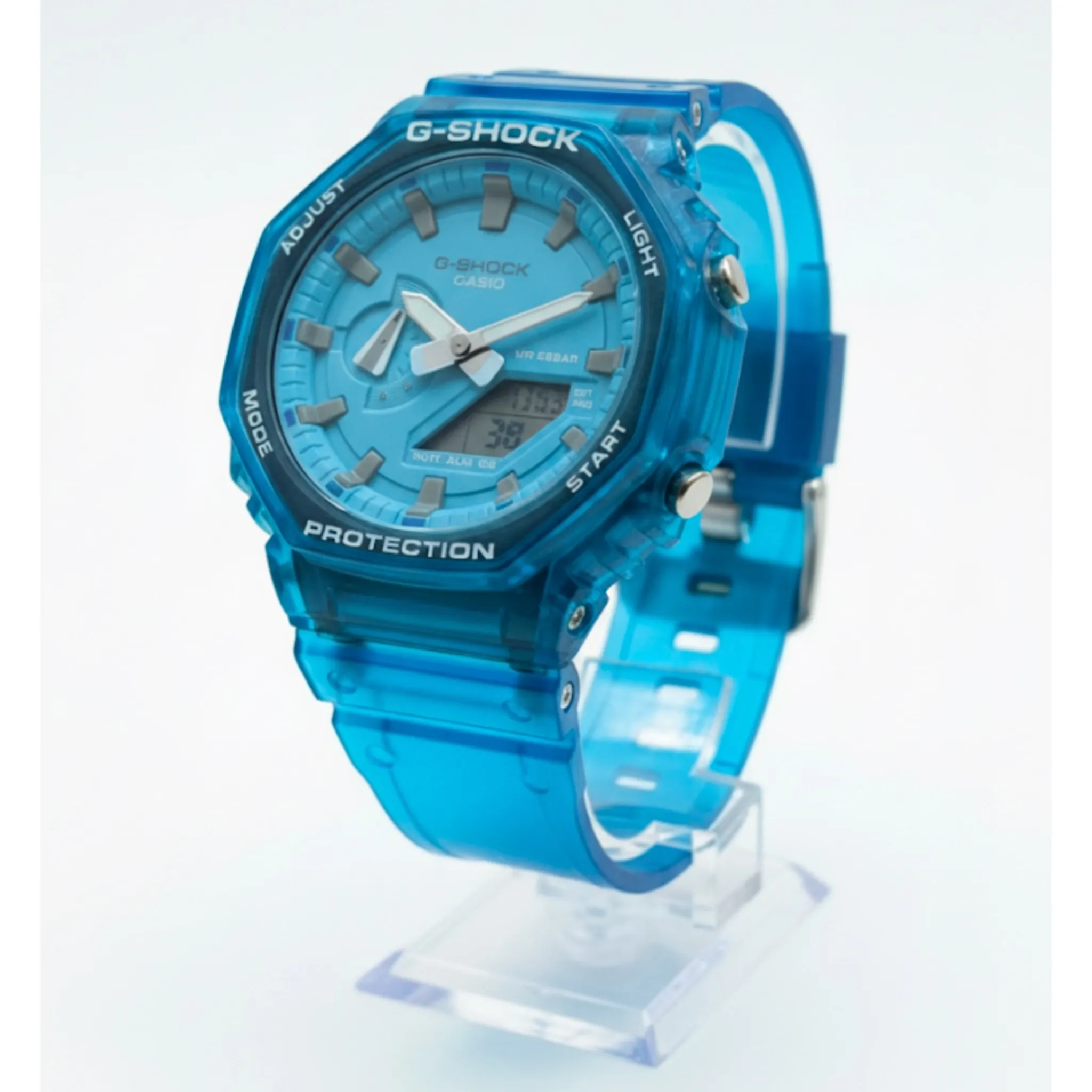 photo-output-2025-11-10T030524.938 (1) ساعت جی شاک2100 آبی شفاف - Image 1